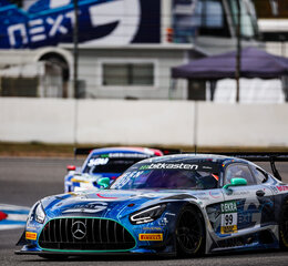 A Mercedes-AMG GT3, with driver Luca Arnold, in the Arnold NextG designed GT3 with blue and silver foiling and circuit board elements at the GT Masters 2023 at the Hockenheimring.